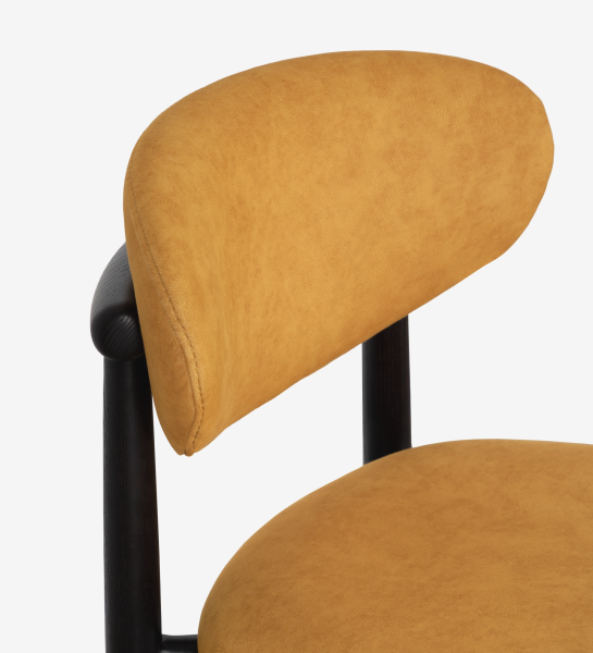 Ash wood chair in wenge color, with seat and backrest upholstered in yellow fabric.