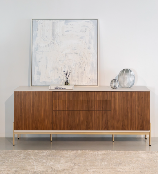 Sideboard with 2 doors, 1 hinged door and two natural walnut drawers, pearl structure and gold lacquered metal legs with levelers.