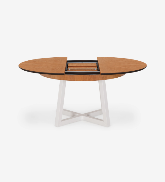 Round extendable dining table with honey oak top and pearl lacquered legs.
