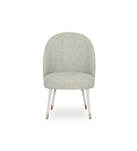Geneve armchair upholstered in green fabric, pearl lacquered feet and golden detail.