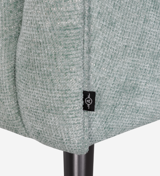 Tokyo armchair upholstered in aqua green fabric, black lacquered legs.