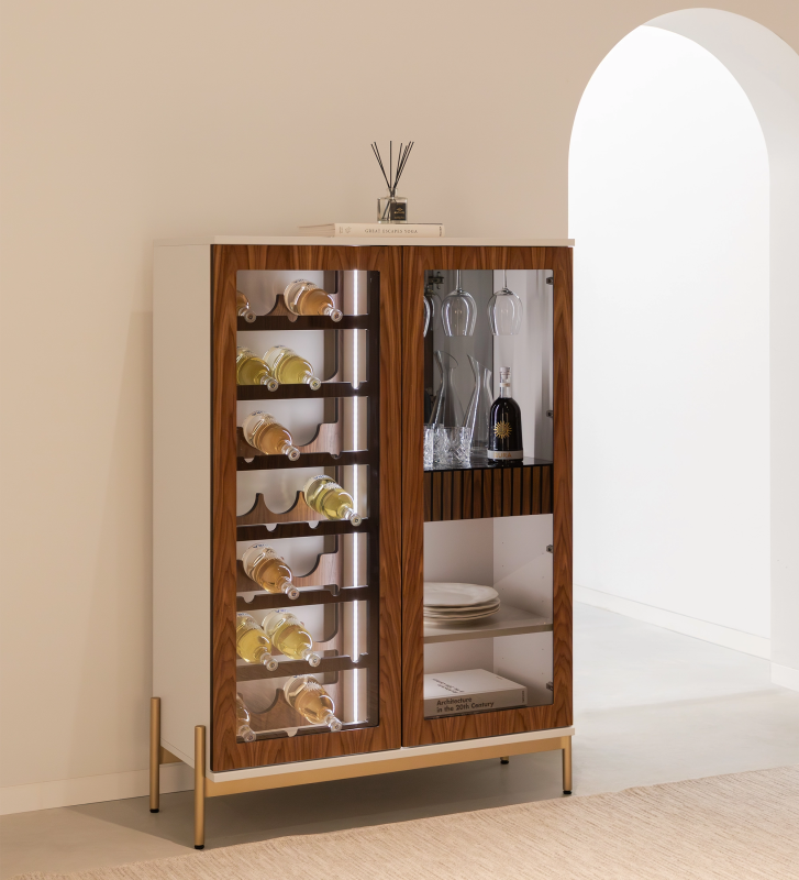Wine cellar cabinet in natural walnut, with lighting, pearl structure and golden lacquered metal feet with levelers.
