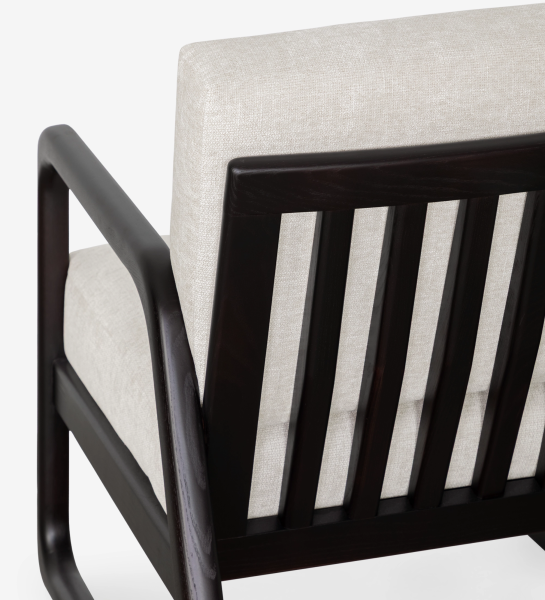 Fauteuil Antarte by IA en bois foncé avec dossier à lattes et coussin beige