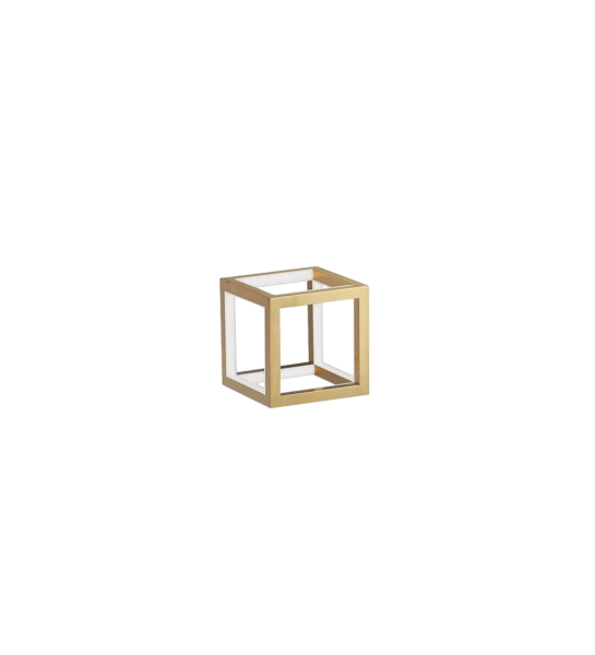 Lámpara de mesa en aluminio y silicona de color dorado.