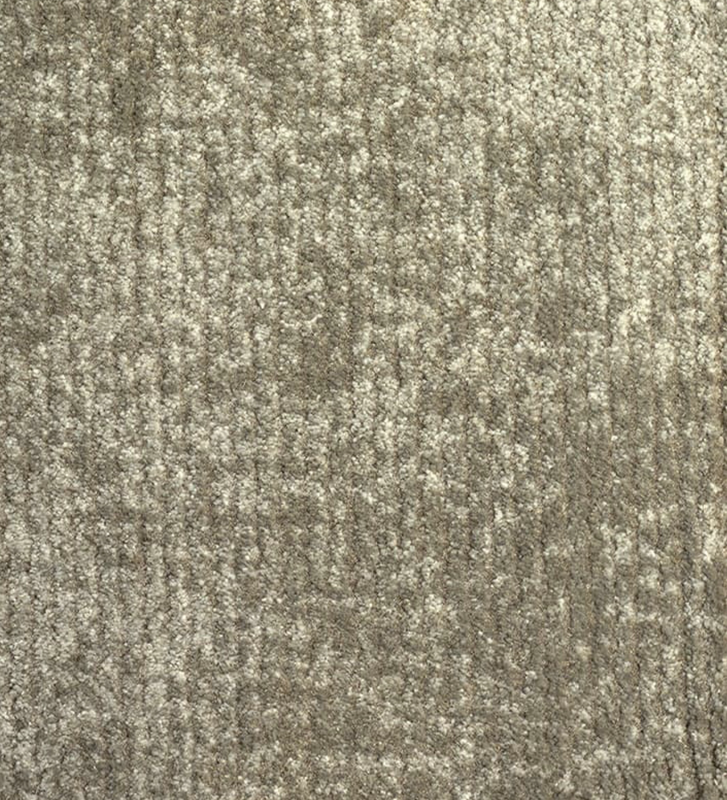 Tapis avec un motif dans des tons de vert, finition bord plié + feutre feltex 6 mm.