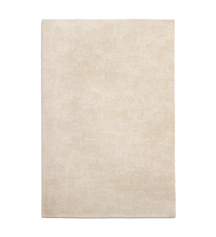Tapis beige avec texture torsadée, finition Line.