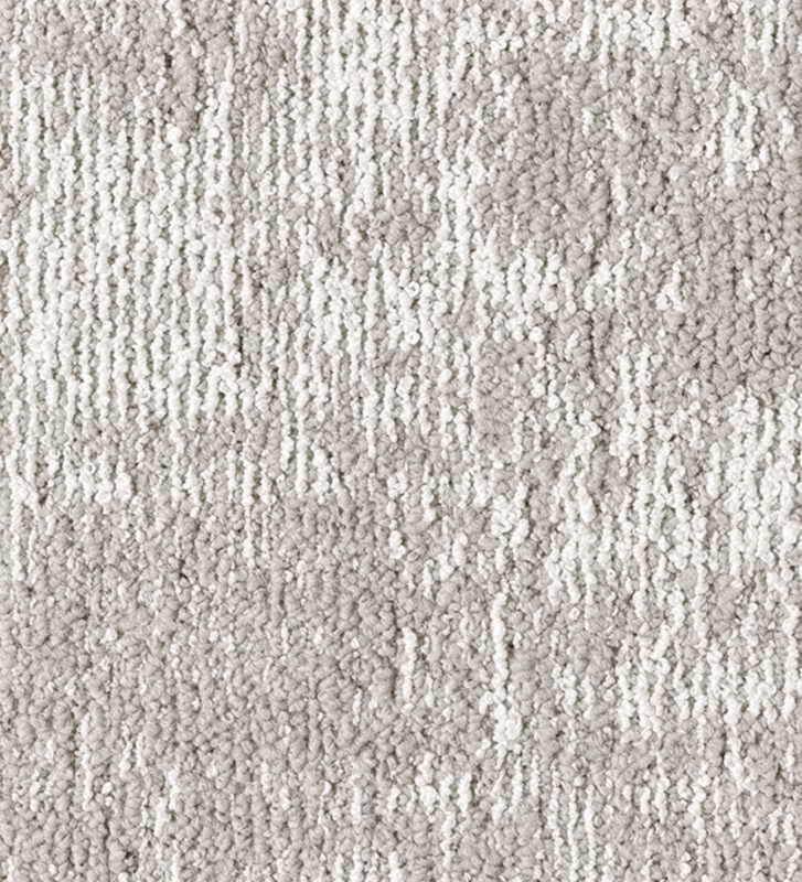 Tapis gris clair avec texture torsadée, finition Line.