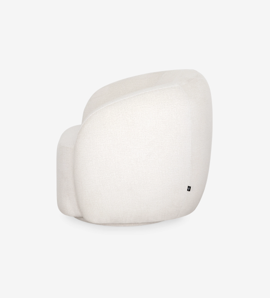 Sillón con base giratoria y completamente tapizado en tejido color perla.