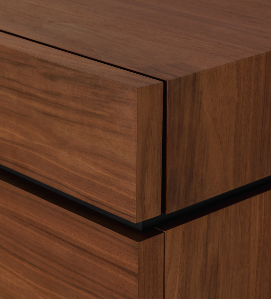 Close-up of Nice Sideboard walnut wood corner and recessed handle gap