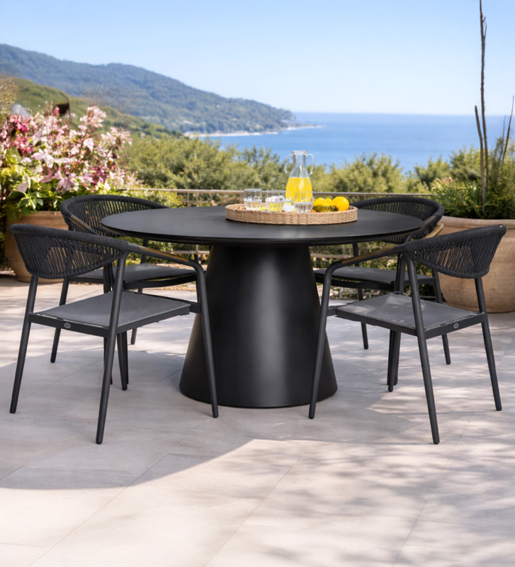 Round dining table, 140 cm, in anthracite aluminium with a ceramic top with grey stone-effect finish.