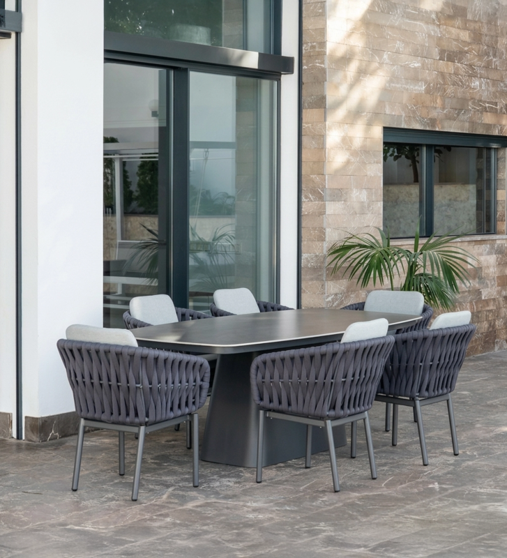 Rectangular dining table, 220 cm, in anthracite aluminium with a ceramic top with anthracite marble-effect finish.