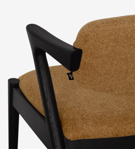 Elba Chair close-up of black wooden armrest and brown textured upholstered seat