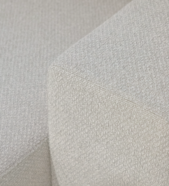 Close-up of beige textured upholstery on Lagos Sofa with Chaise Longue
