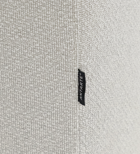 Lagos Sofa with Chaise Longue close-up of beige textured upholstery and fabric brand tag